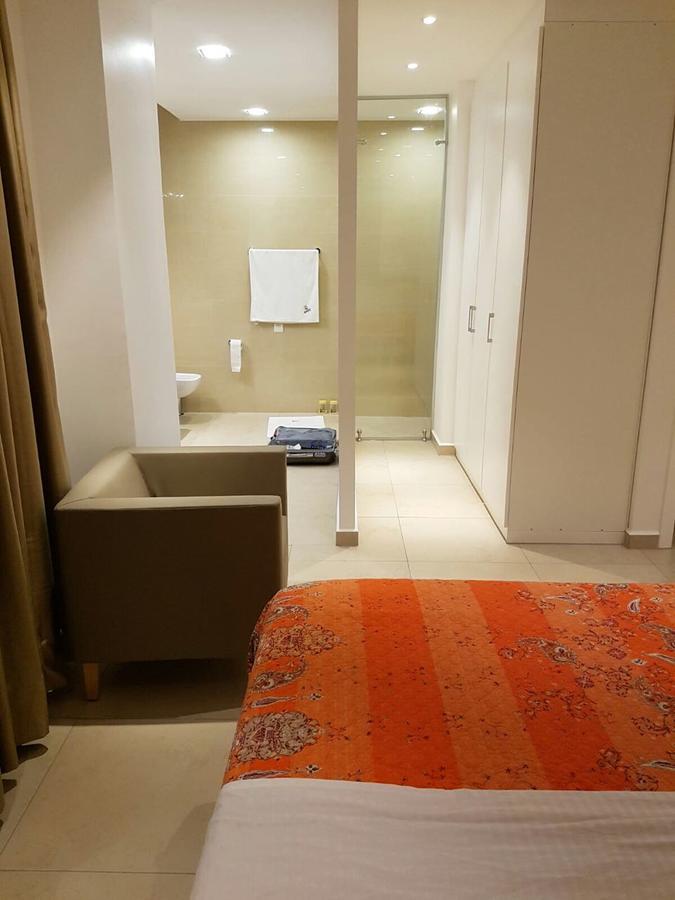 Suncity Hotel Apartment Аккра Екстер'єр фото